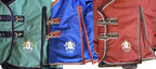 T TEKE equestrian blanket detailing cross belly surcingles and elastic leg straps.