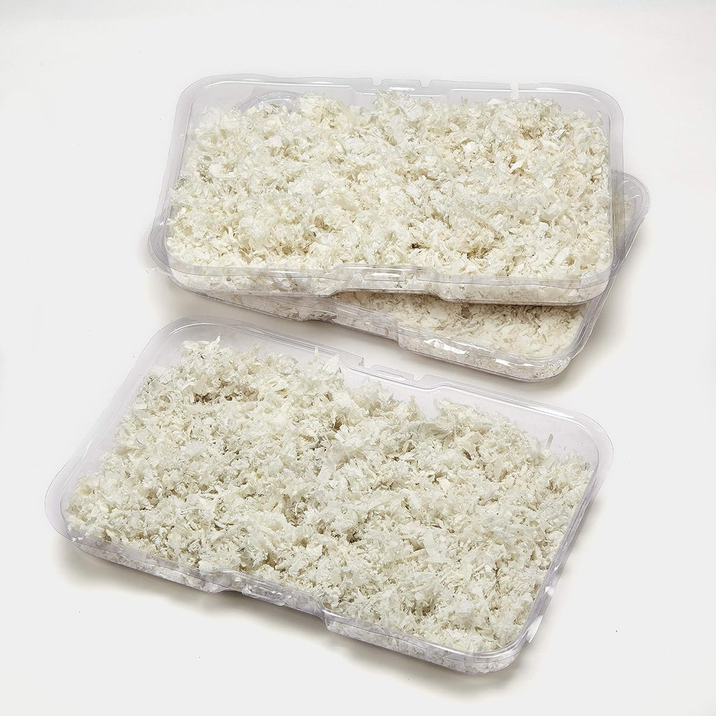 Three stackable Kaytee disposable bedding trays for small animals
