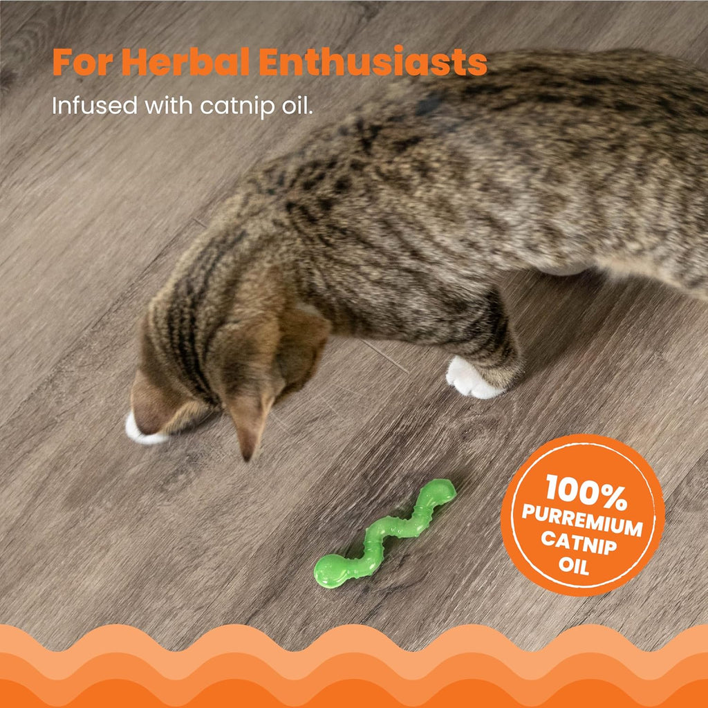 Cat playing actively with green Catstages Orka Kat Wiggle Worm toy