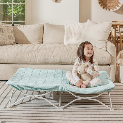 Regalo My Cot Portable Toddler Bed in seafoam green front view displaying the unfolded steel frame and quilted fitted sheet for travel comfort.