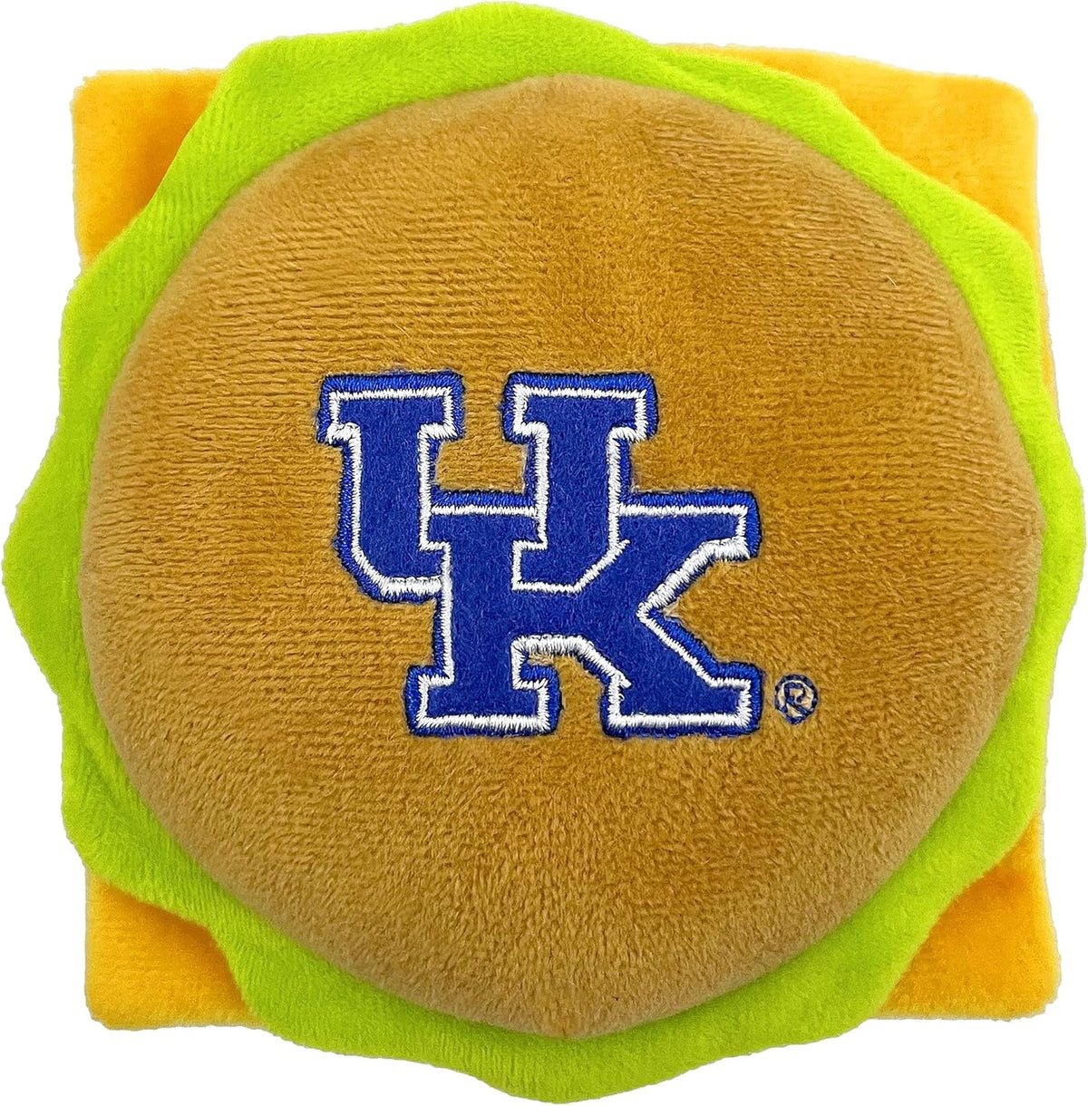 Dog playing with Purdue Boilermakers plush squeak toy