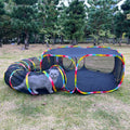 GONPETGP outdoor cat enclosure front view showing the mesh tent and tunnel setup in a backyard garden