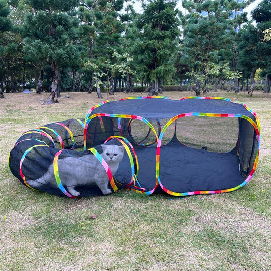 GONPETGP outdoor cat enclosure front view showing the mesh tent and tunnel setup in a backyard garden