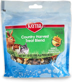 Hand holding Kaytee Country Harvest Treat Blend for Small Pets