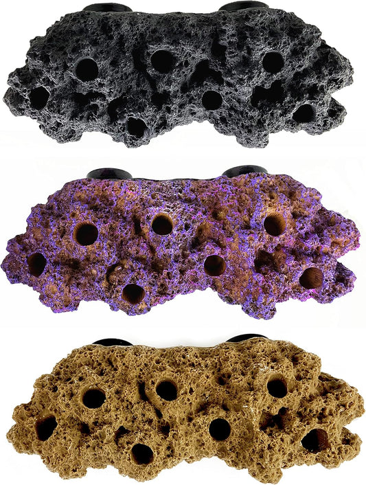 Reefing Art magnetic coral frag rack rock front view inside a marine aquarium display.
