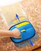 Washing electrostatic pet grooming glove under running water for reuse