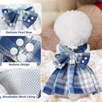 Close up view of the pearl accents and big bowknot on the small pet dress