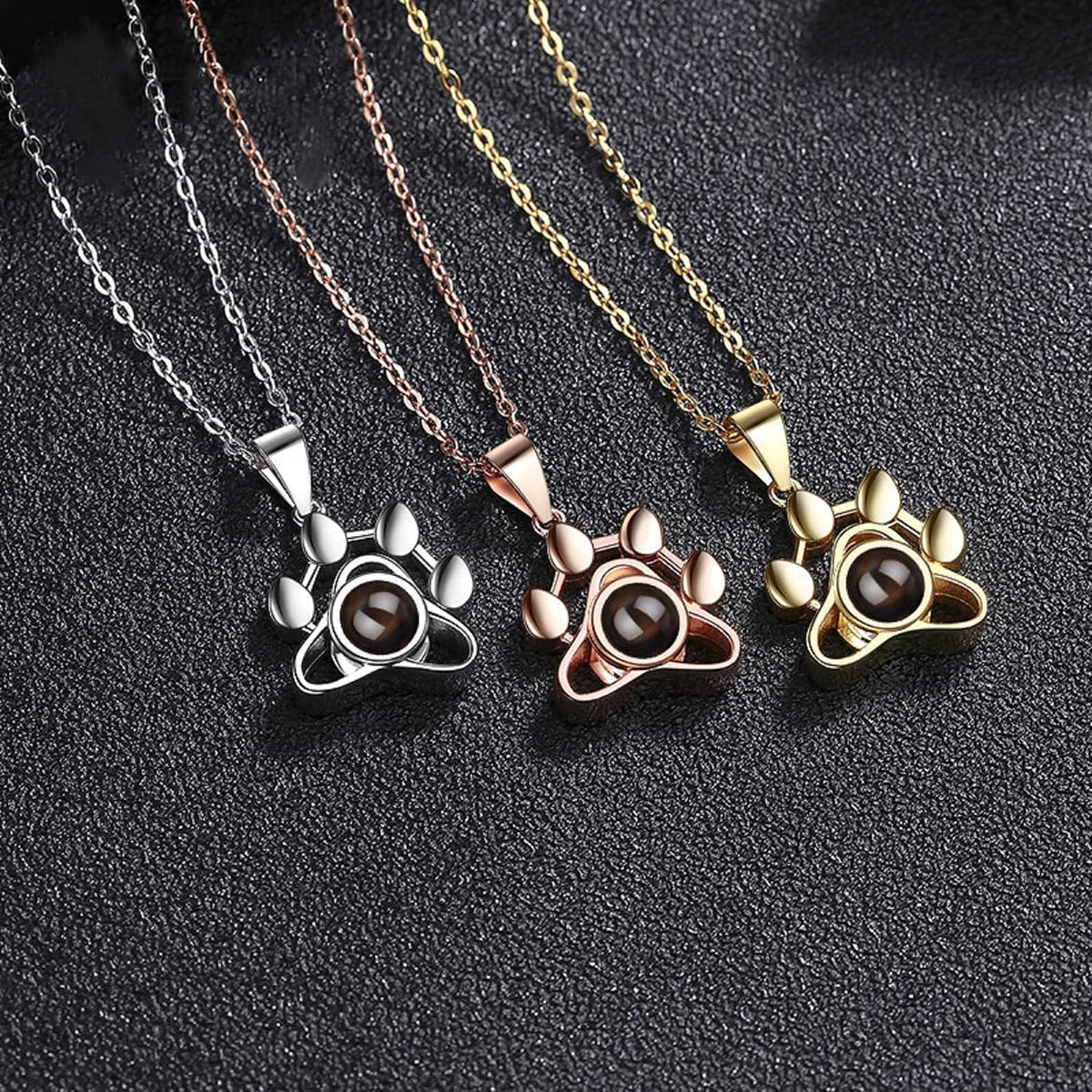 Getname Necklace dog and cat paw print design necklace cast in premium polished silver.