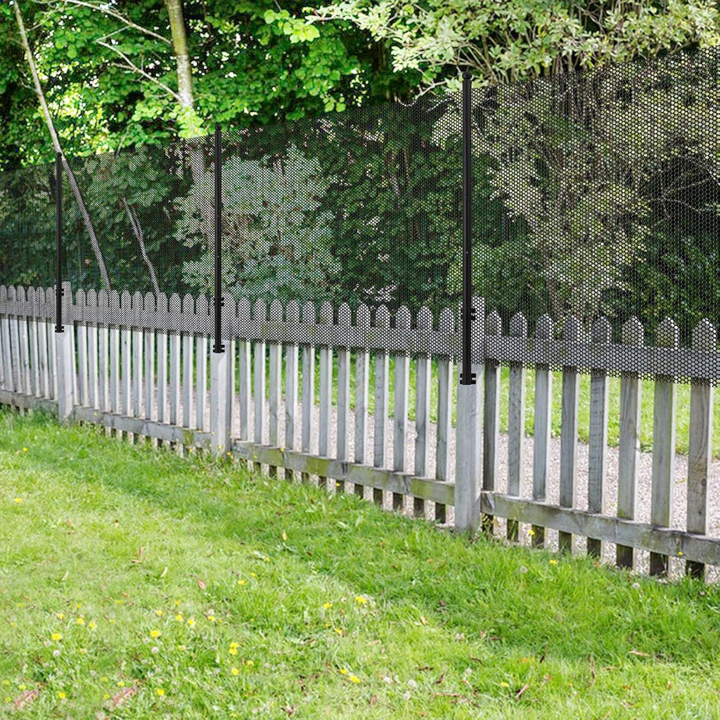 Cat fence retrofit system installed on wood fence