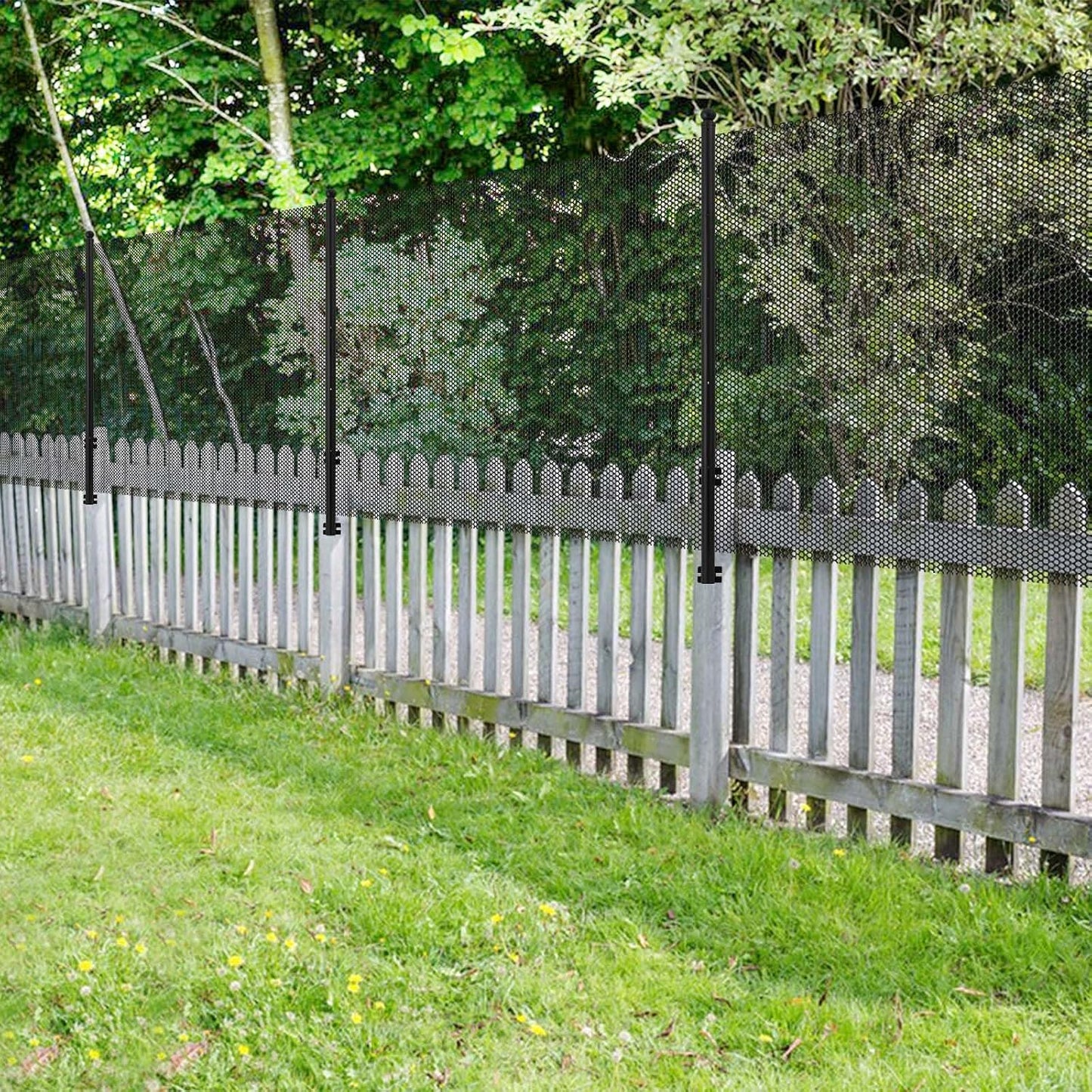Cat fence retrofit system installed on wood fence