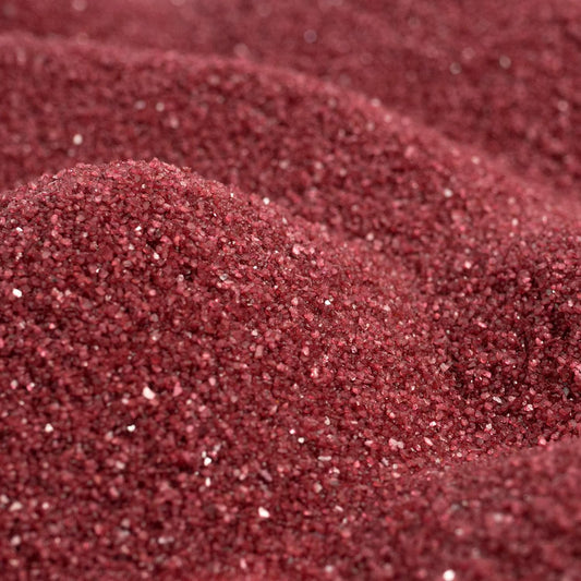 Close up texture of Sandtastik dark red coarse grains