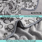 Cozy puppy fleece blanket being folded for outdoor travel and camping