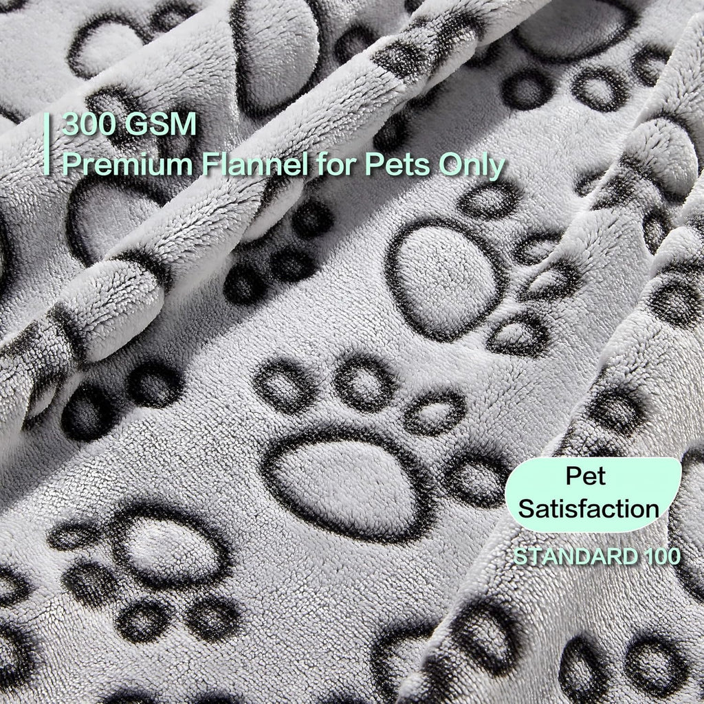 Washable fleece pet throw covering a living room couch for protection