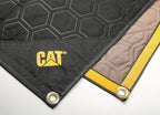 Close up view of the reinforced metal rivets on the CAT utility mat.
