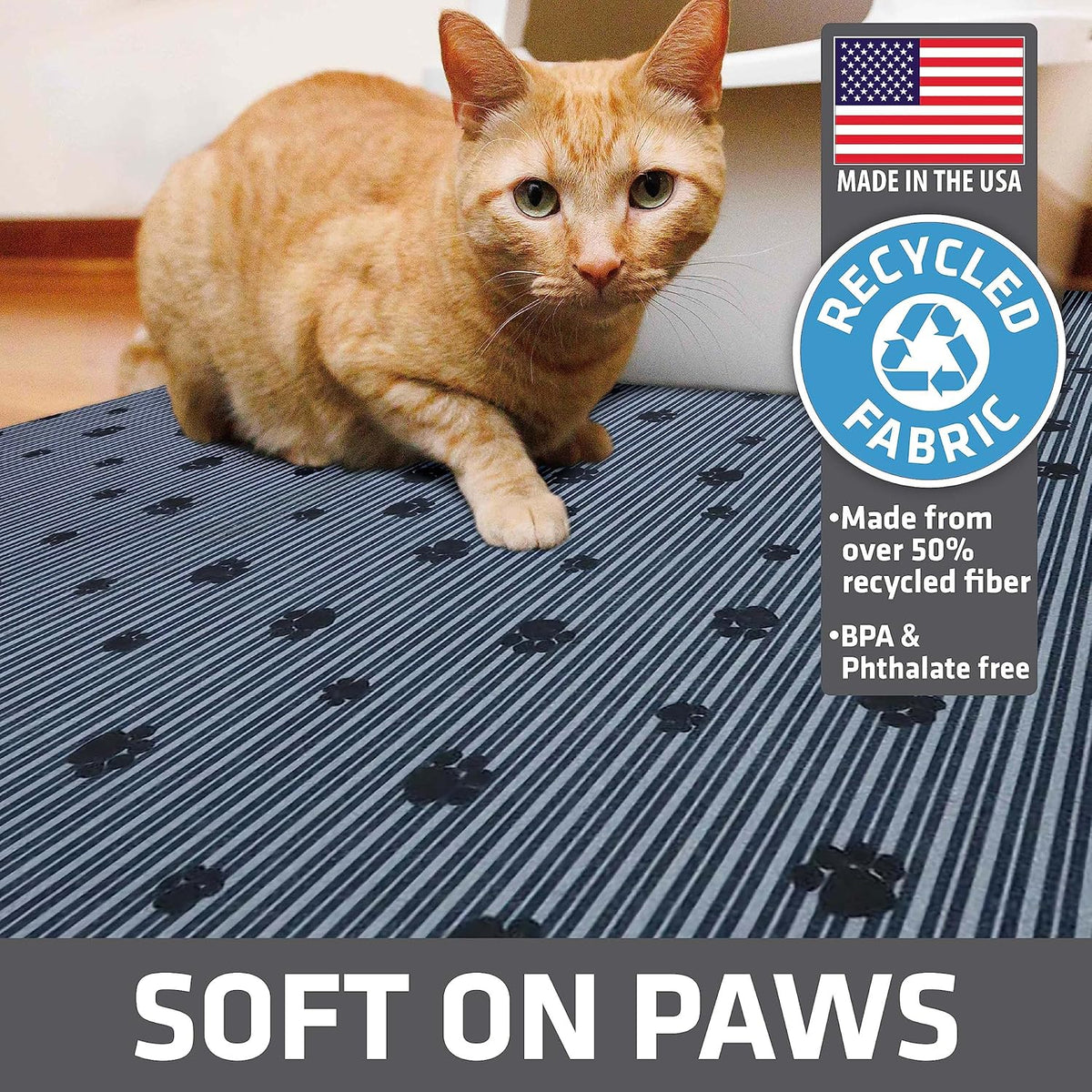 An extra large grey Drymate cat litter box mat laid out flat on a tiled floor.