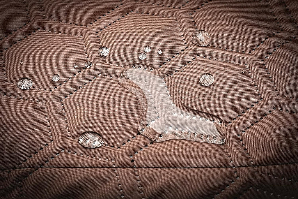 CAT moving blanket cushioning furniture to prevent scratches and transport damage.