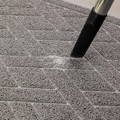 Waterproof backing of gray Pawkin cat litter mat showing non slip feature
