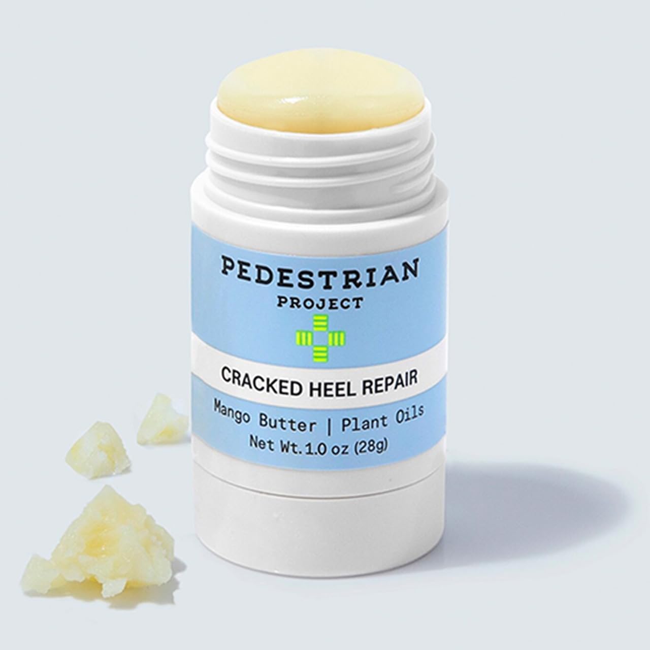 Pedestrian Project 1 ounce twist up stick being applied directly to dry cracked heels
