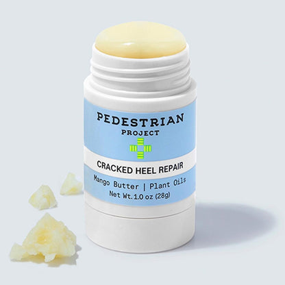 Pedestrian Project 1 ounce twist up stick being applied directly to dry cracked heels