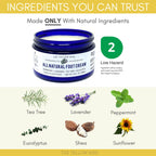 The Yellow Bird tea tree foot cream jar displayed next to natural ingredients.