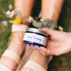 Lifestyle application shot of The Yellow Bird foot balm for dry heels.