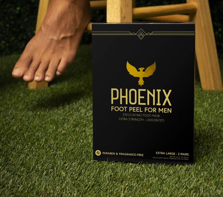 Man wearing extra large foot peel mask booties while relaxing