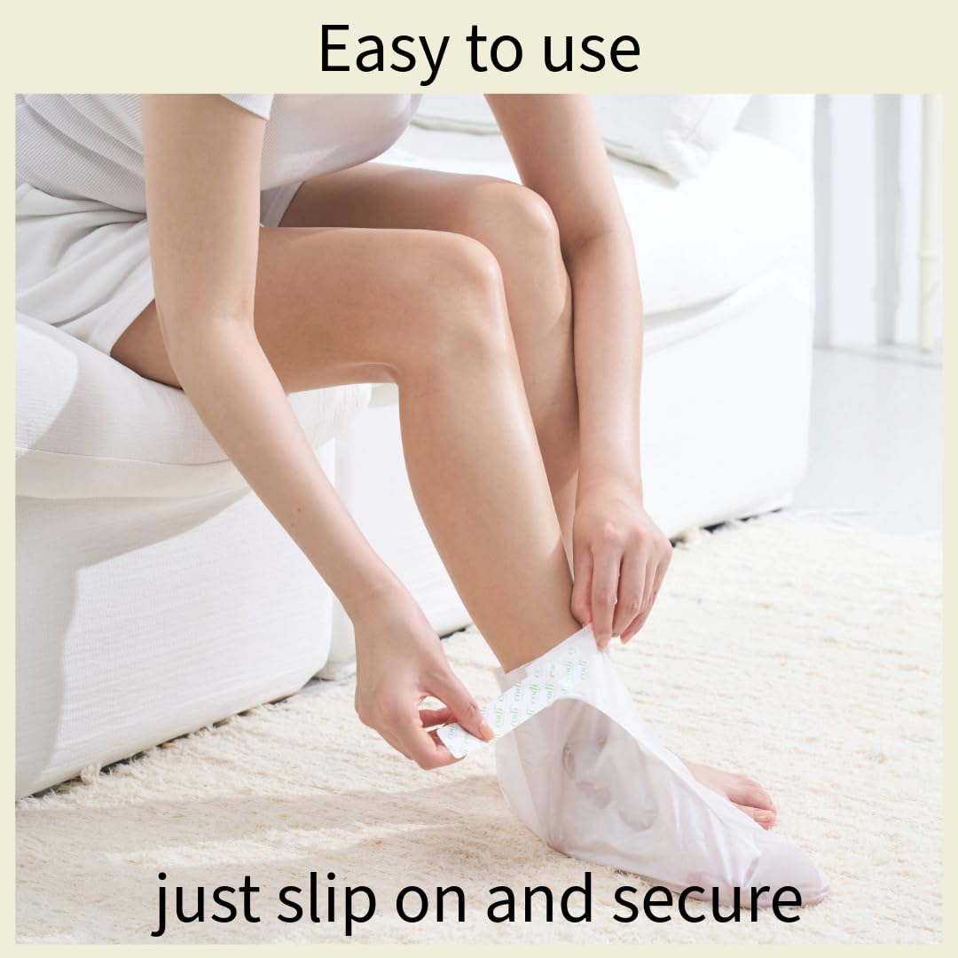 Hydrating foot treatment sock booties laid out flat displaying the secure ankle fit design.