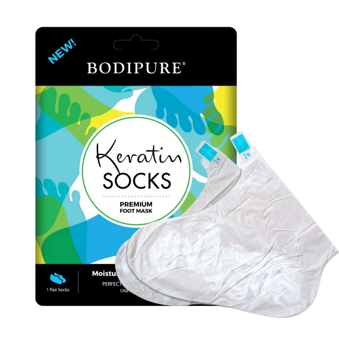 Close up of keratin moisturizing socks being worn for a home spa pedicure.