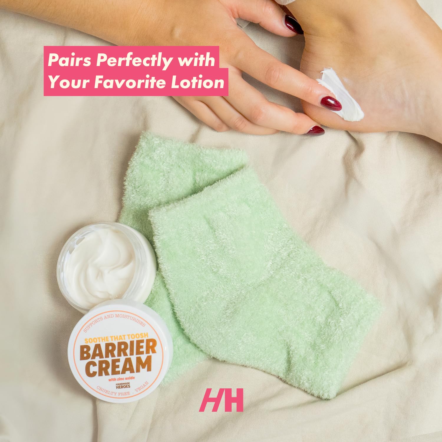 Two piece set of Handmade Heroes moisturizing overnight socks displayed flat.