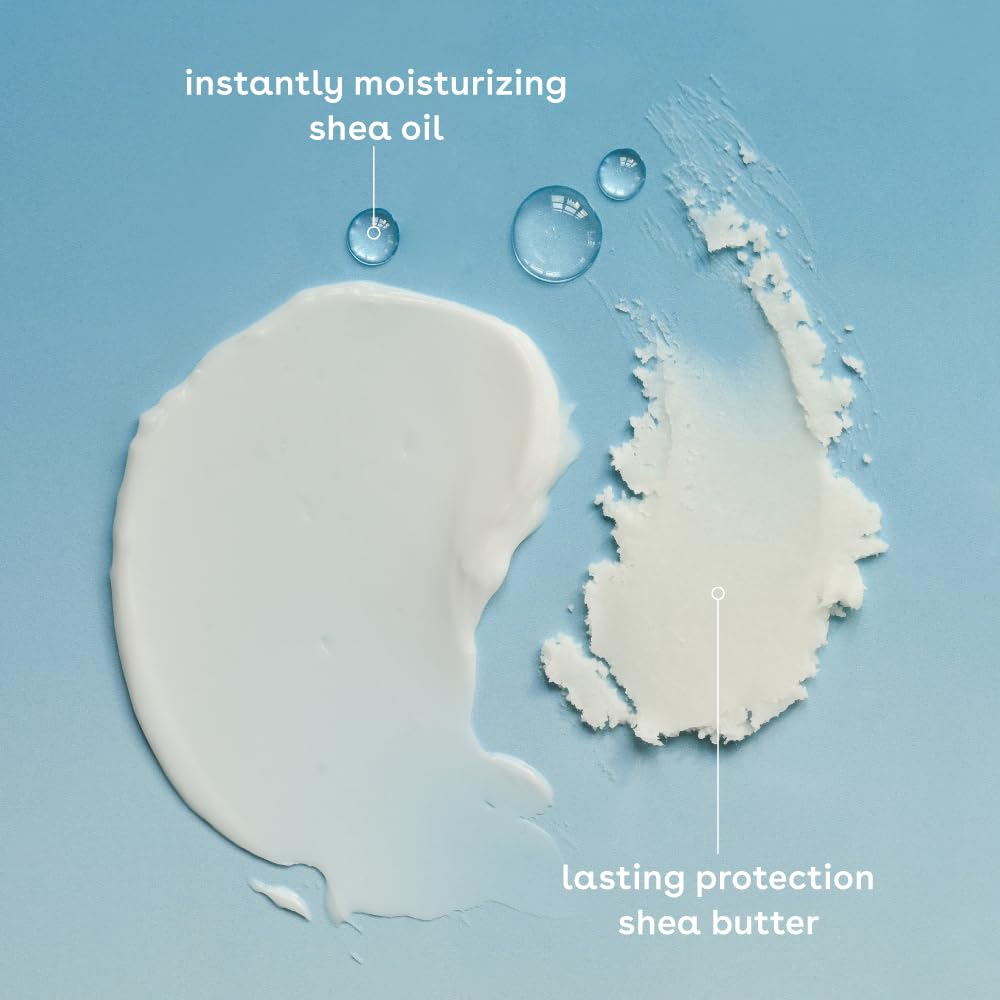Eos Shea Better Hand Cream travel size tube held in hand