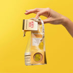 Burt's Bees almond milk hand cream container closeup