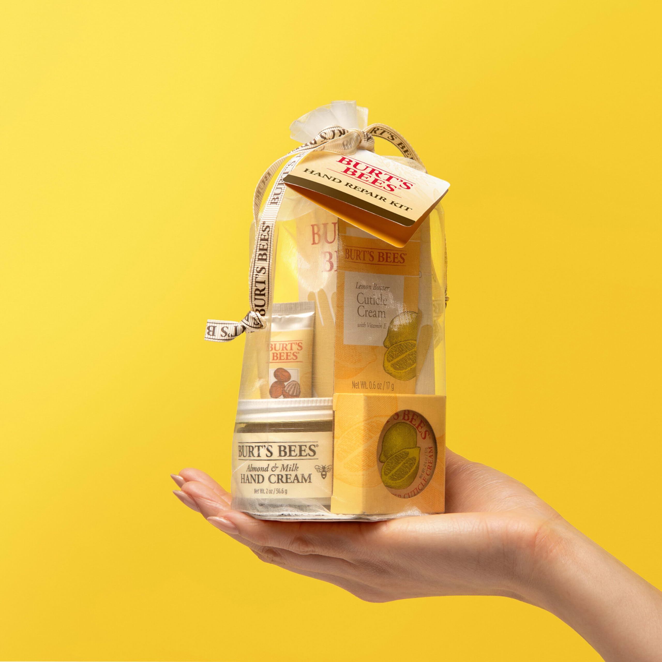 White cotton moisturizing gloves included in the Burt's Bees hand spa kit
