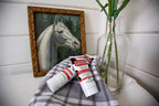 Udderly Smooth Hand Cream travel-friendly four ounce size held in hand for scale
