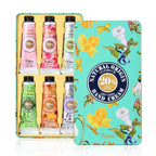 Complete six piece hand cream collection displayed with exterior packaging