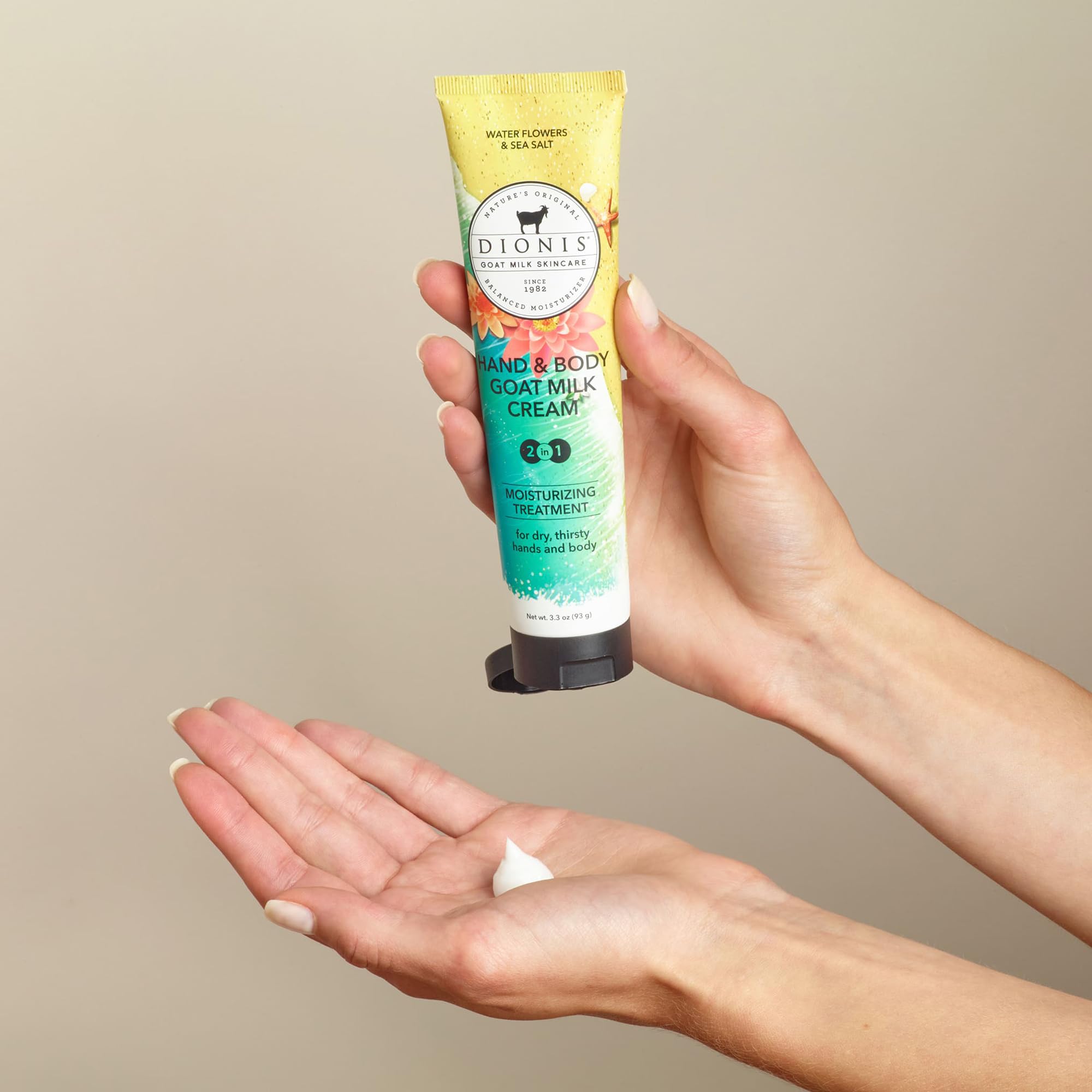 Dionis Goat Milk Hand And Body Cream 3.3 Ounce tube placed vertically on a clean background