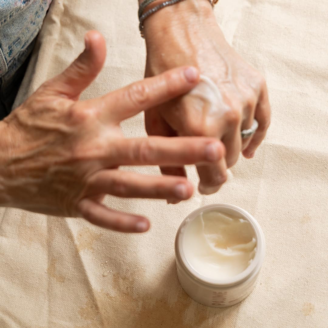 Application of Paume hydration mask on dry hands