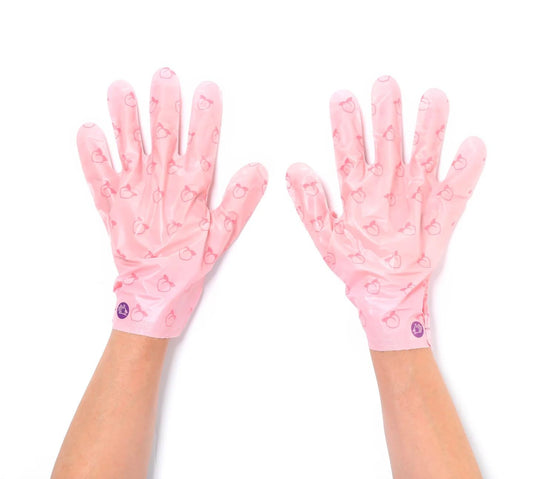 Tonymoly Korean hand treatment gloves being worn for hydrating therapy