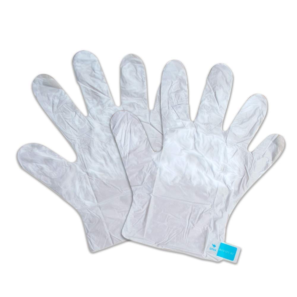 Person using Bodipure hand mask gloves for skin repair
