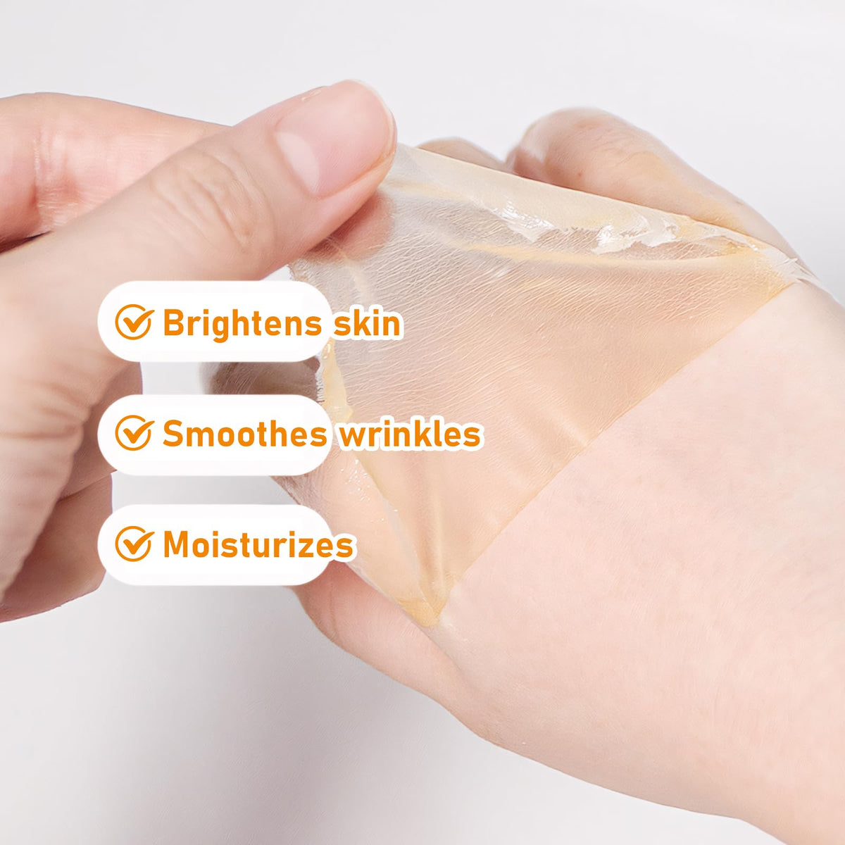 Enakshi Yiowcoo Honey Milk Wax Hand Mask lifestyle shot with soft smooth hands
