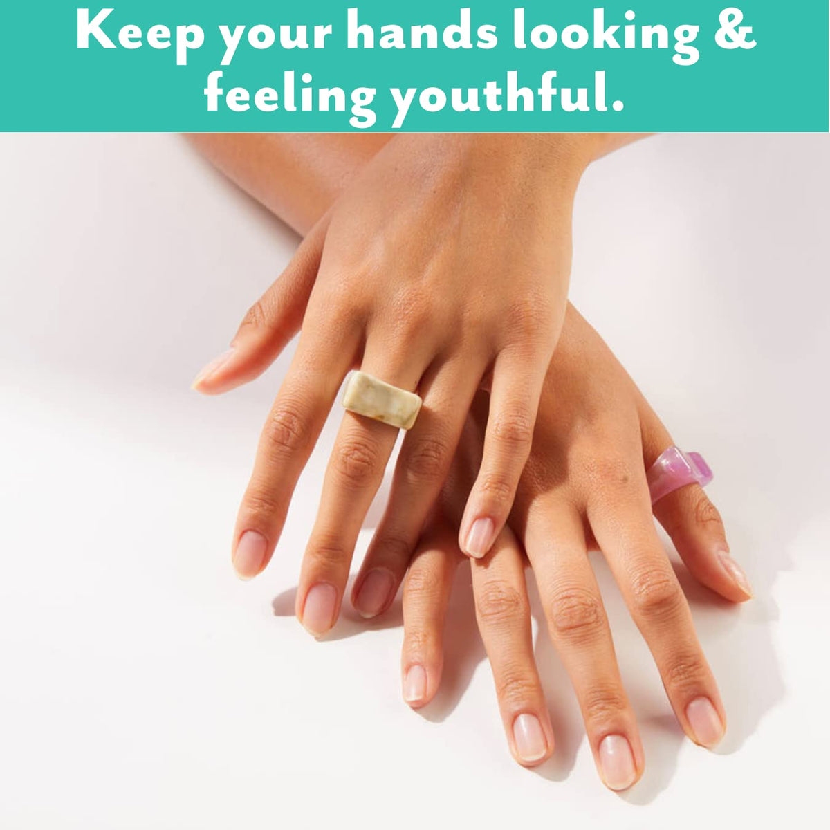 Model wearing Patchology self-warming gloves for dry hands