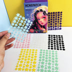 Close up of colorful star-shaped hydrocolloid acne patches in various colors