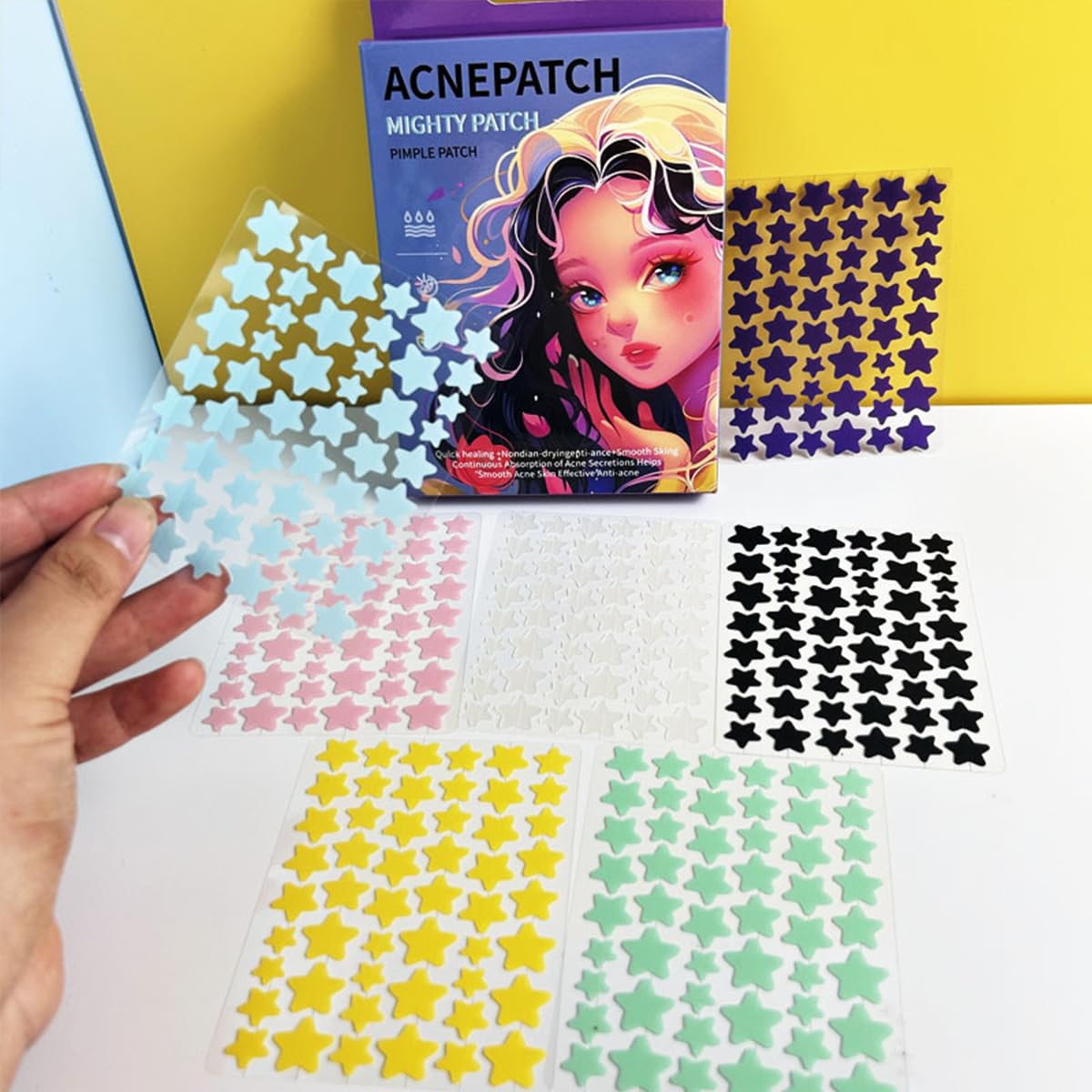 Close up of colorful star shaped acne patches on skin