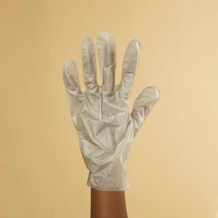 Close up of Voesh collagen glove ingredients and benefits label