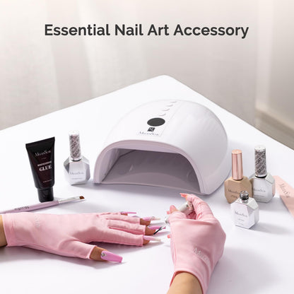 Woman wearing pink MelodySusie UV shield gloves for gel nail lamp