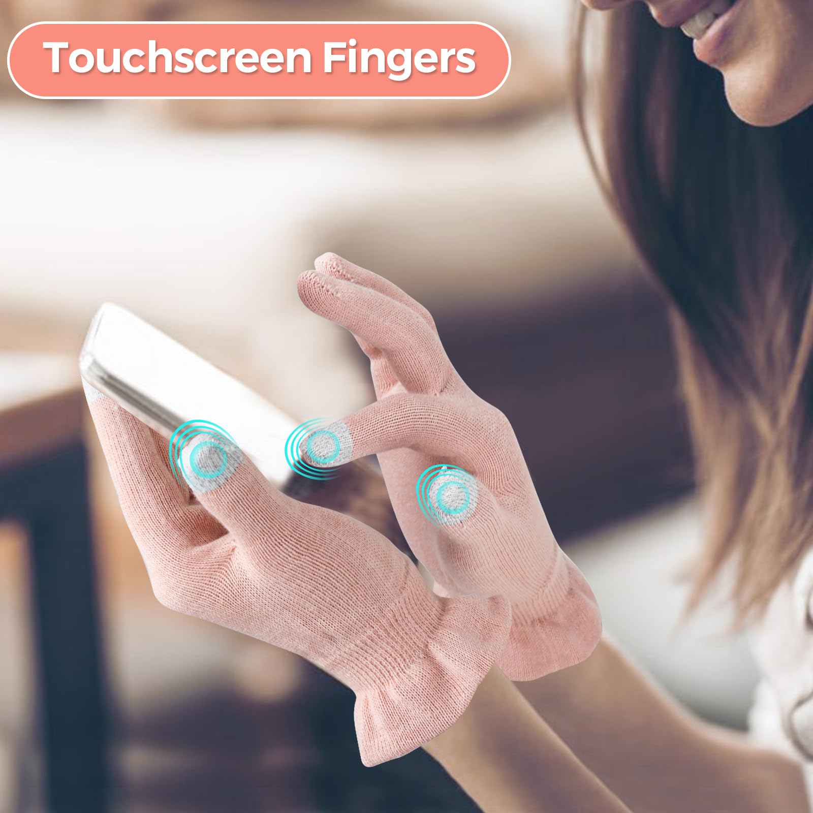 Person wearing Donfri pink cotton gloves using a smartphone