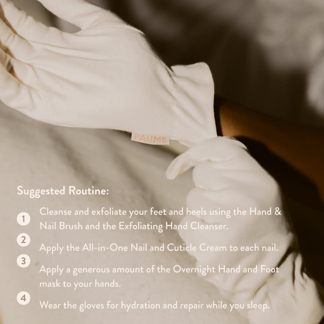 Pair of beige Paume overnight cotton gloves on white background