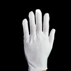 Demonstration of using cotton gloves for jewelry inspection