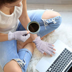 MIG4U eczema and dry hand treatment gloves laid flat to show design