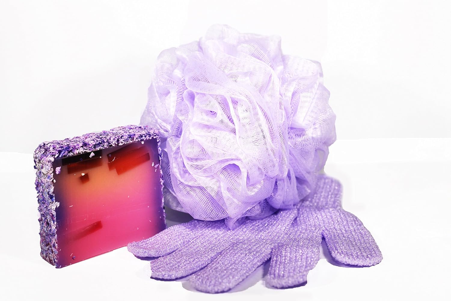 Beauty By Earth bath gloves showing hanging loop feature