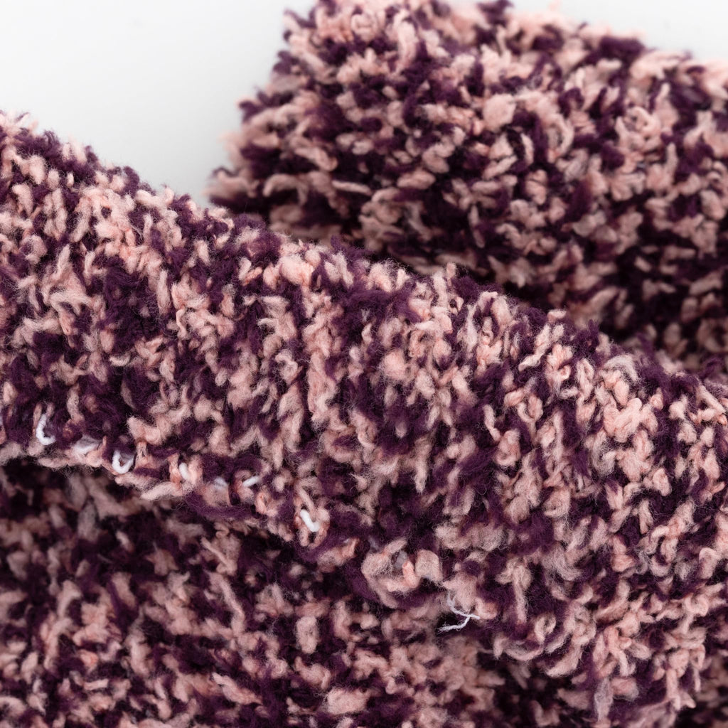 Close-up view of the ultra-soft feather yarn fabric and smooth toe seam design